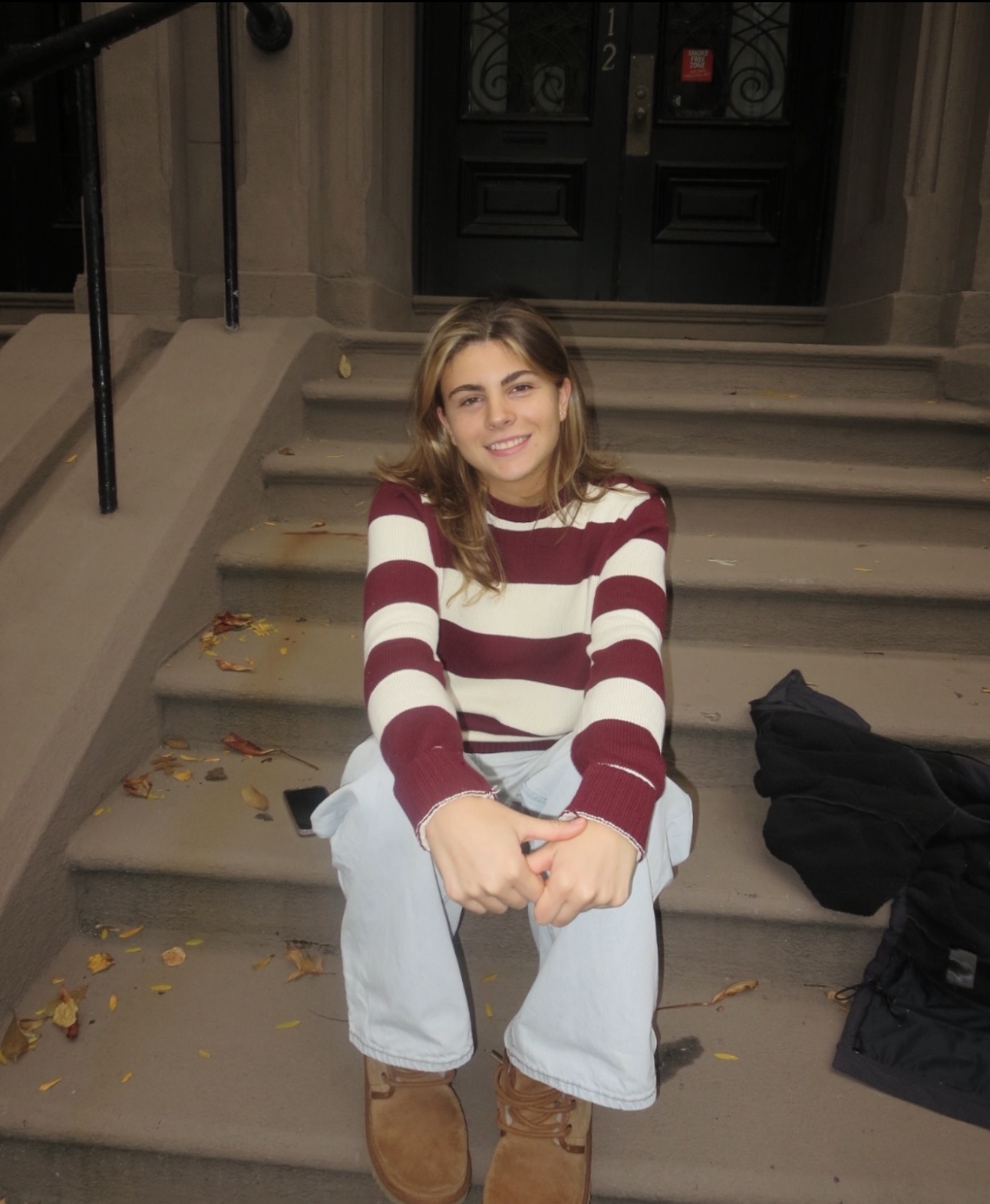 Julia Pizzoferrato seated outdoors